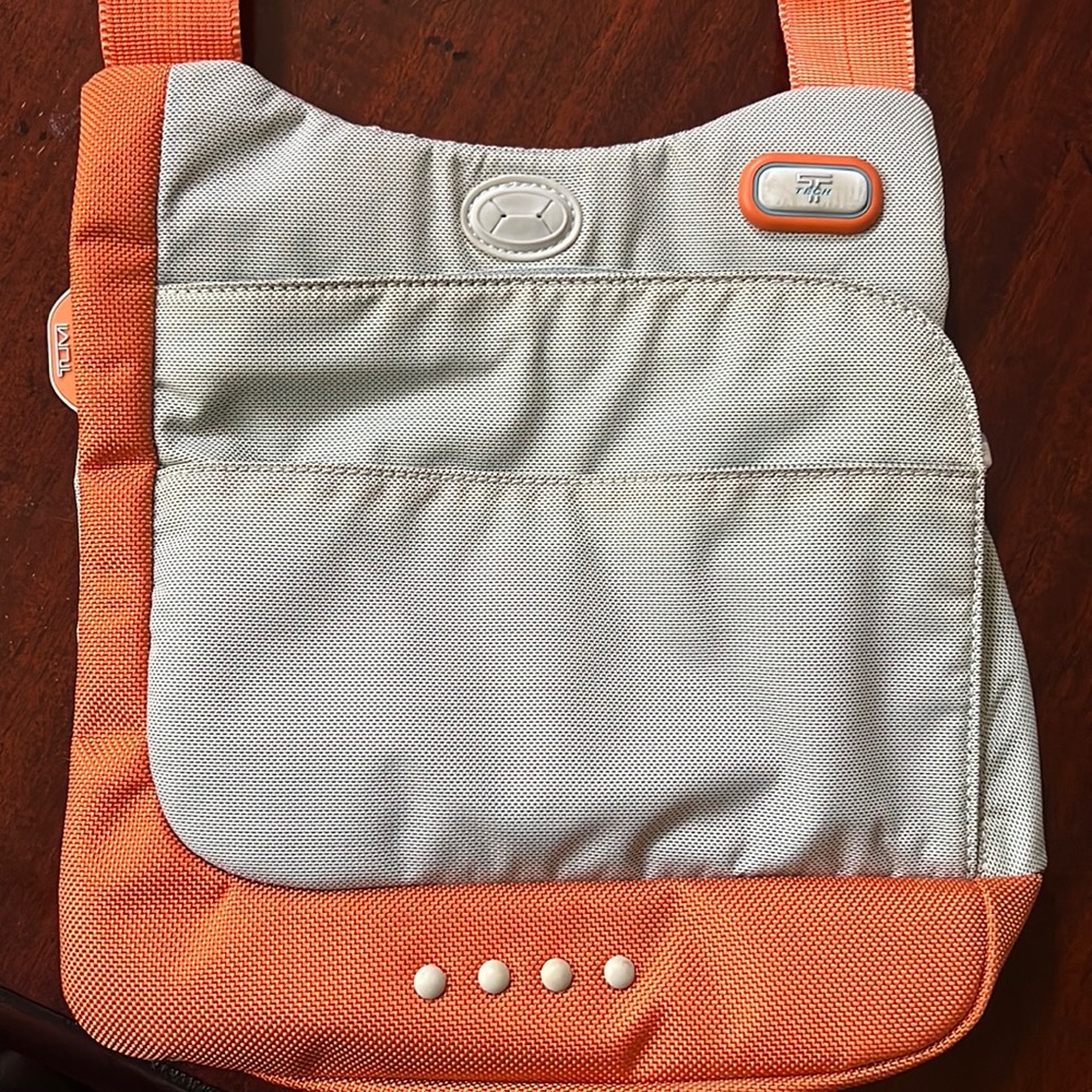 Tumi shoulder bag for traveling and every day.